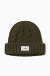 Front flat lay view of the soft and warm moss Cable Knit Beanie that has a custom JOAH BROWN 