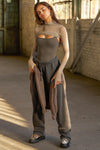 Full body front view of model posing in the soft and stretchy sueded carob Smoothing Cami with a scoop neckline and thin straps