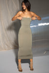 Full body front view of model posing in the fitted sage modal Foldover Maxi Skirt with an adjustable fold over waistband, wearing it as a tube dress