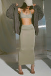 Full body front view of model posing in the fitted sage modal Foldover Maxi Skirt with an adjustable fold-over waistband