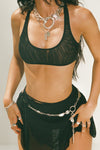 Front view of model posing in the the black mesh scoop neck racerback bra
